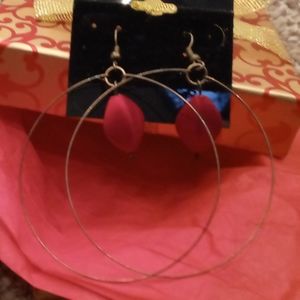 Red hoop earrings